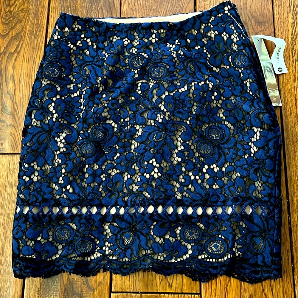 SALE! NWT Aqua Navy Lace Lined Mini Skirt. Side Zipper lingerie straps
